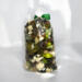 Handcrafted Cotton Fields Potpourri featuring dried botanicals in green and cream hues, tied with a green bow for a fresh, clean scent.